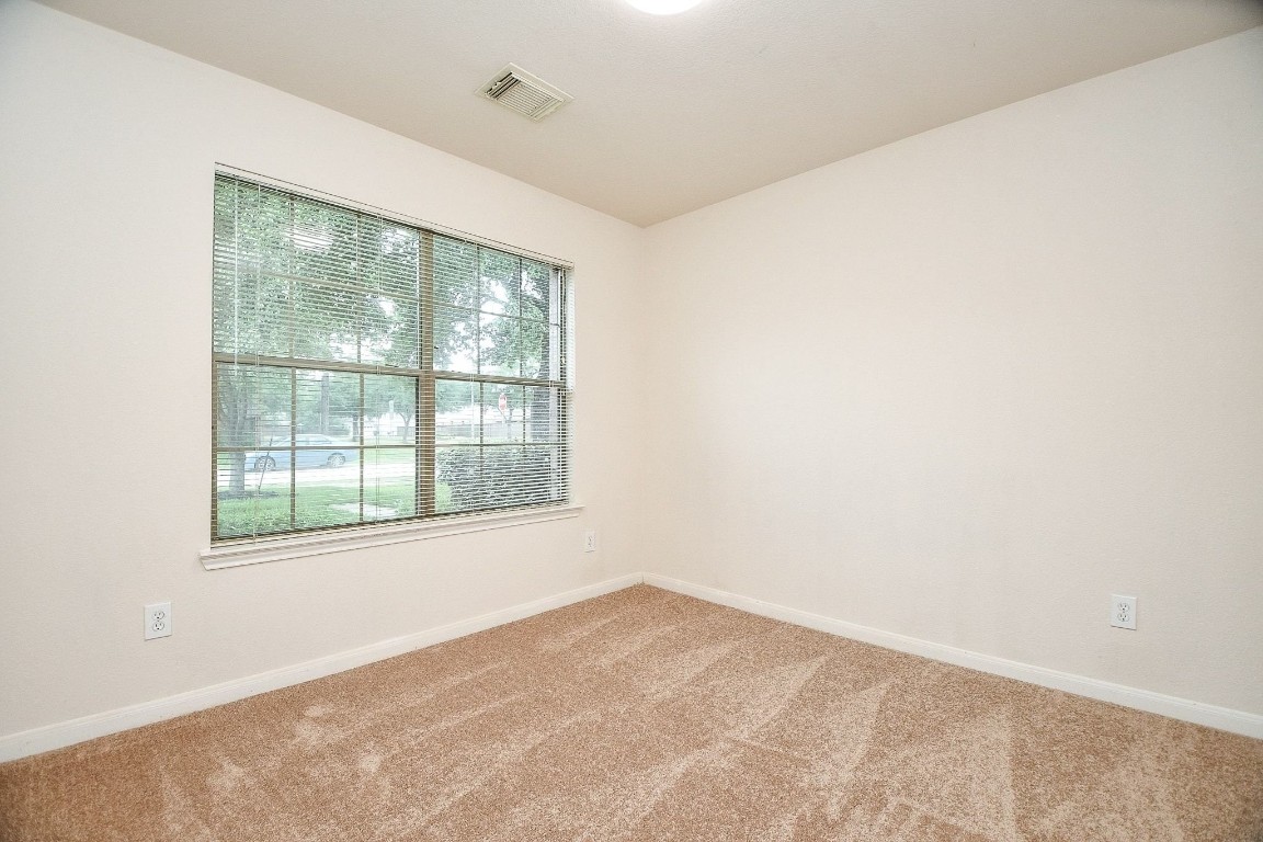 29530 Legends Glen Drive Spring, TX 77386 - Photo 17 of 50 an empty room with a window