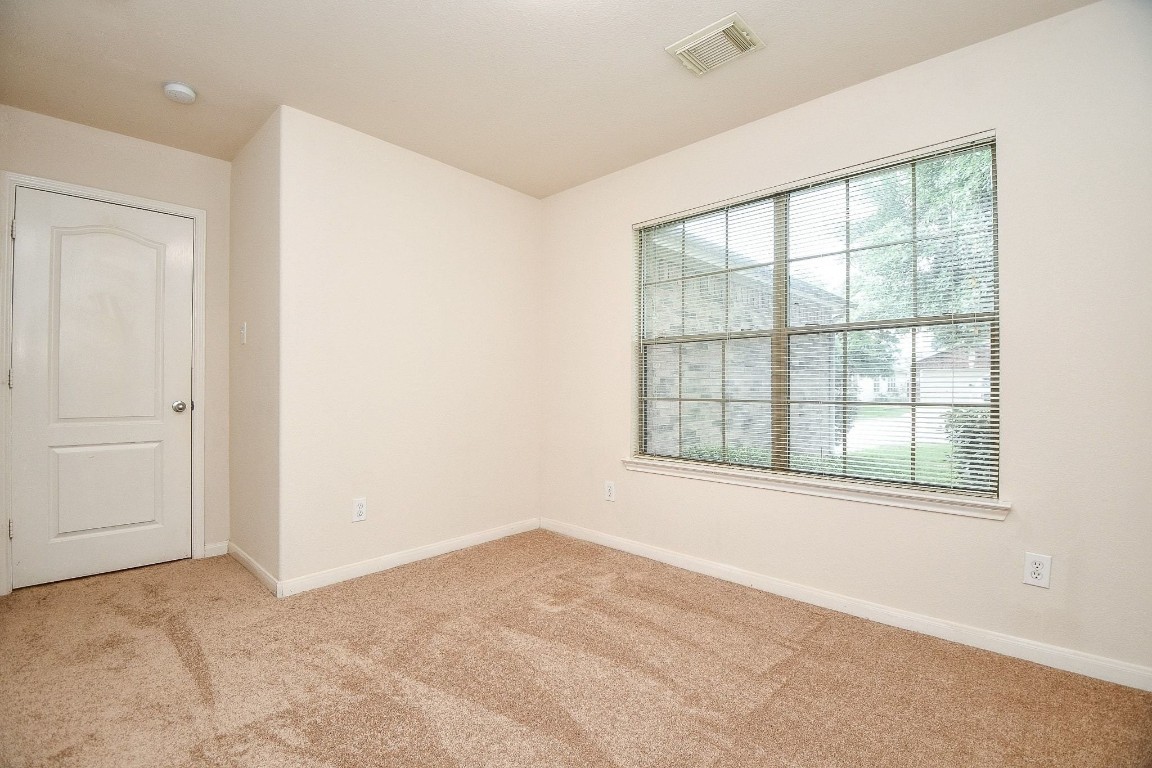 29530 Legends Glen Drive Spring, TX 77386 - Photo 18 of 50 an empty room with a window