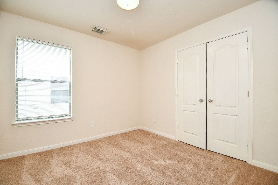 29530 Legends Glen Drive Spring, TX 77386 - Photo 20 of 50 an empty room with a window