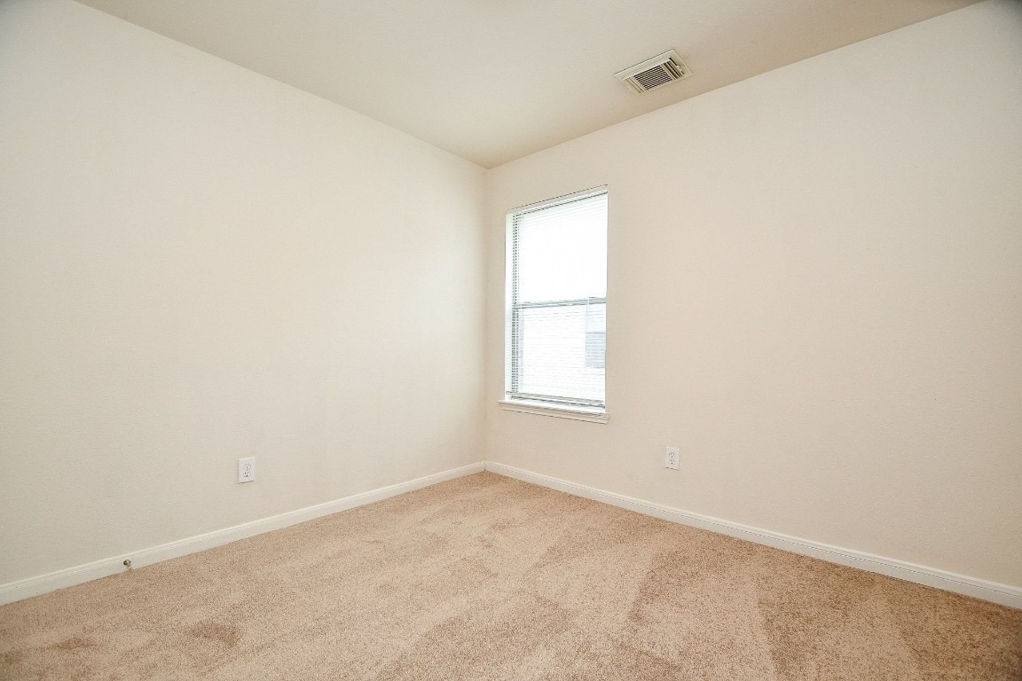 29530 Legends Glen Drive Spring, TX 77386 - Photo 21 of 50 an empty room with a window