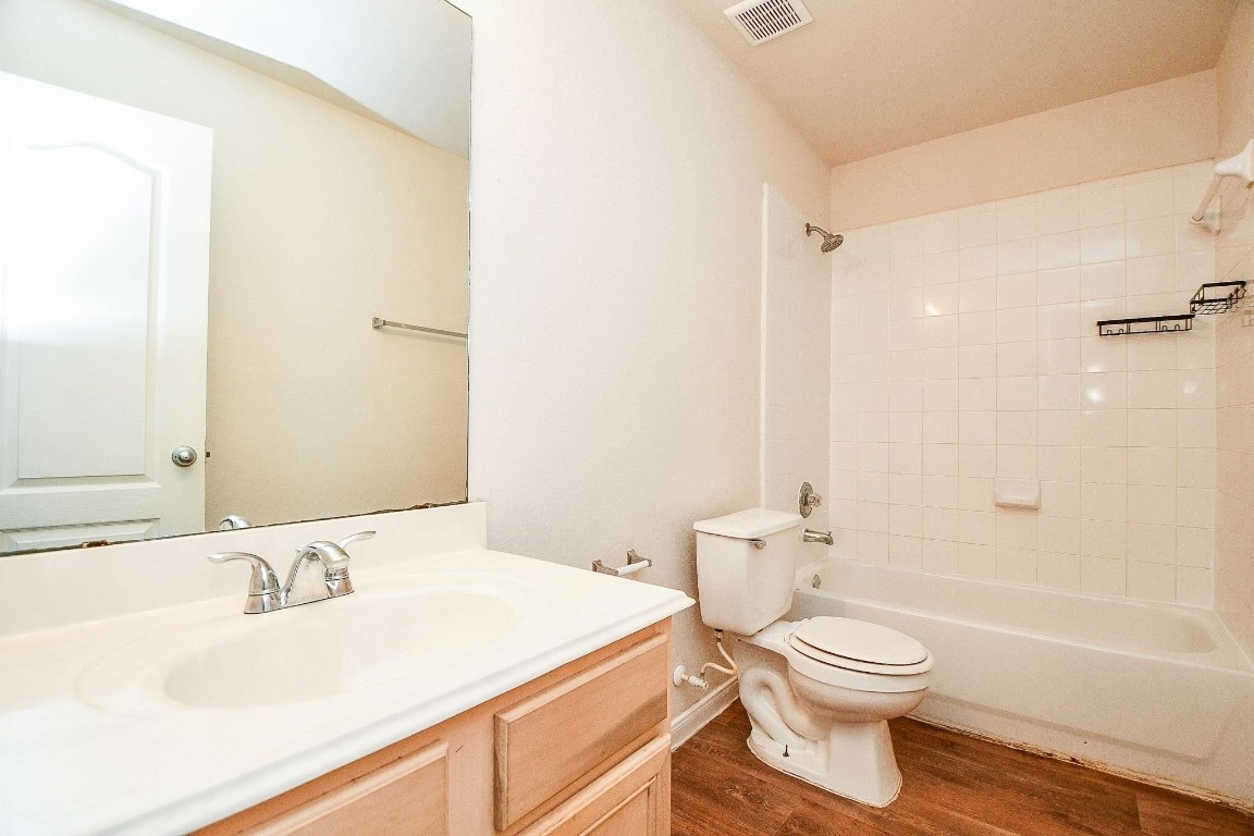 29530 Legends Glen Drive Spring, TX 77386 - Photo 22 of 50 a bathroom with a sink a toilet and a bathtub