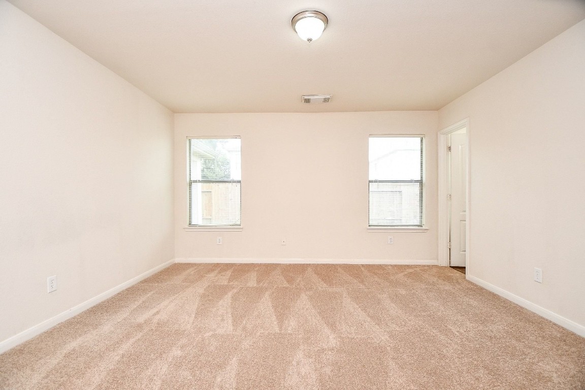 29530 Legends Glen Drive Spring, TX 77386 - Photo 26 of 50 an empty room with windows