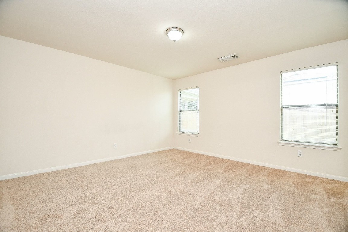 29530 Legends Glen Drive Spring, TX 77386 - Photo 27 of 50 an empty room with windows