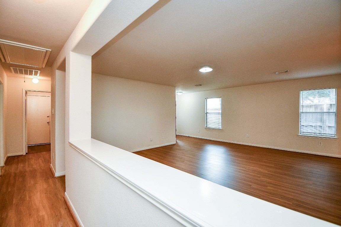 29530 Legends Glen Drive Spring, TX 77386 - Photo 38 of 50 a view of empty room with wooden floor and fan