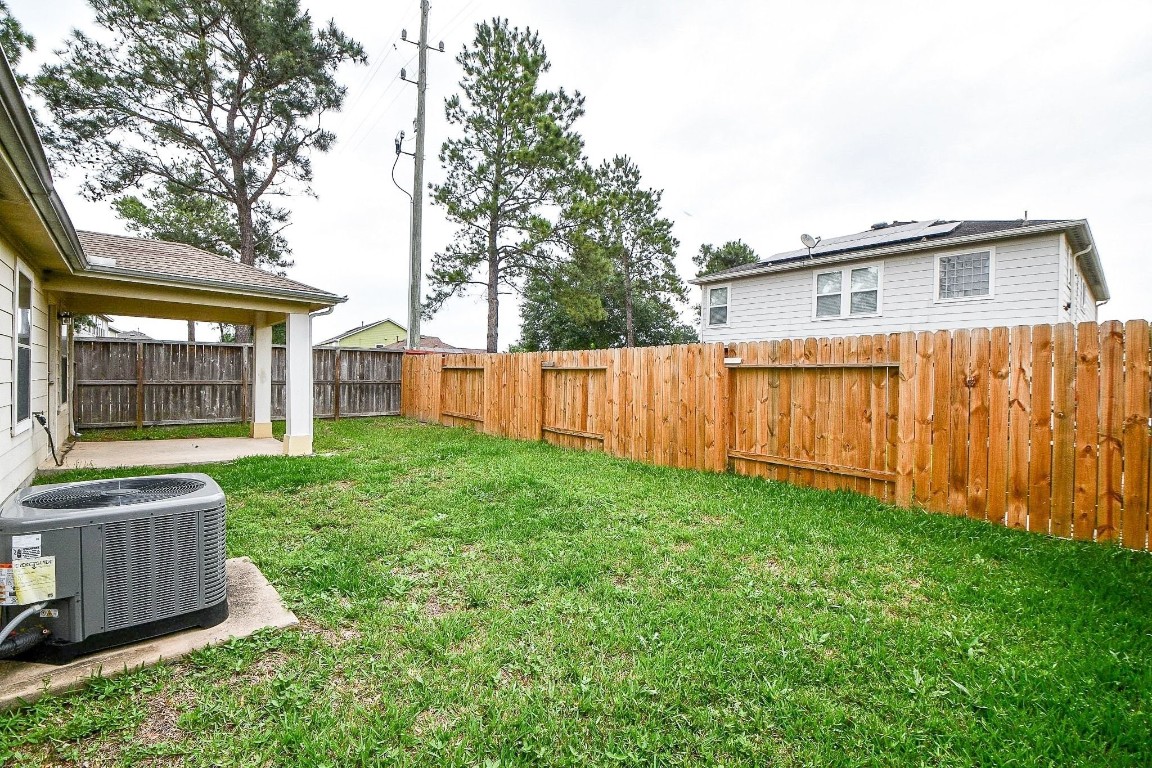 29530 Legends Glen Drive Spring, TX 77386 - Photo 47 of 50 front view of a house with a yard