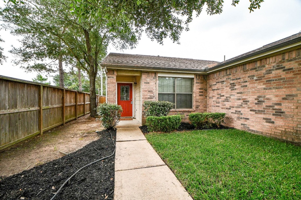 29530 Legends Glen Drive Spring, TX 77386 - Photo 5 of 50 a front view of a house with garden