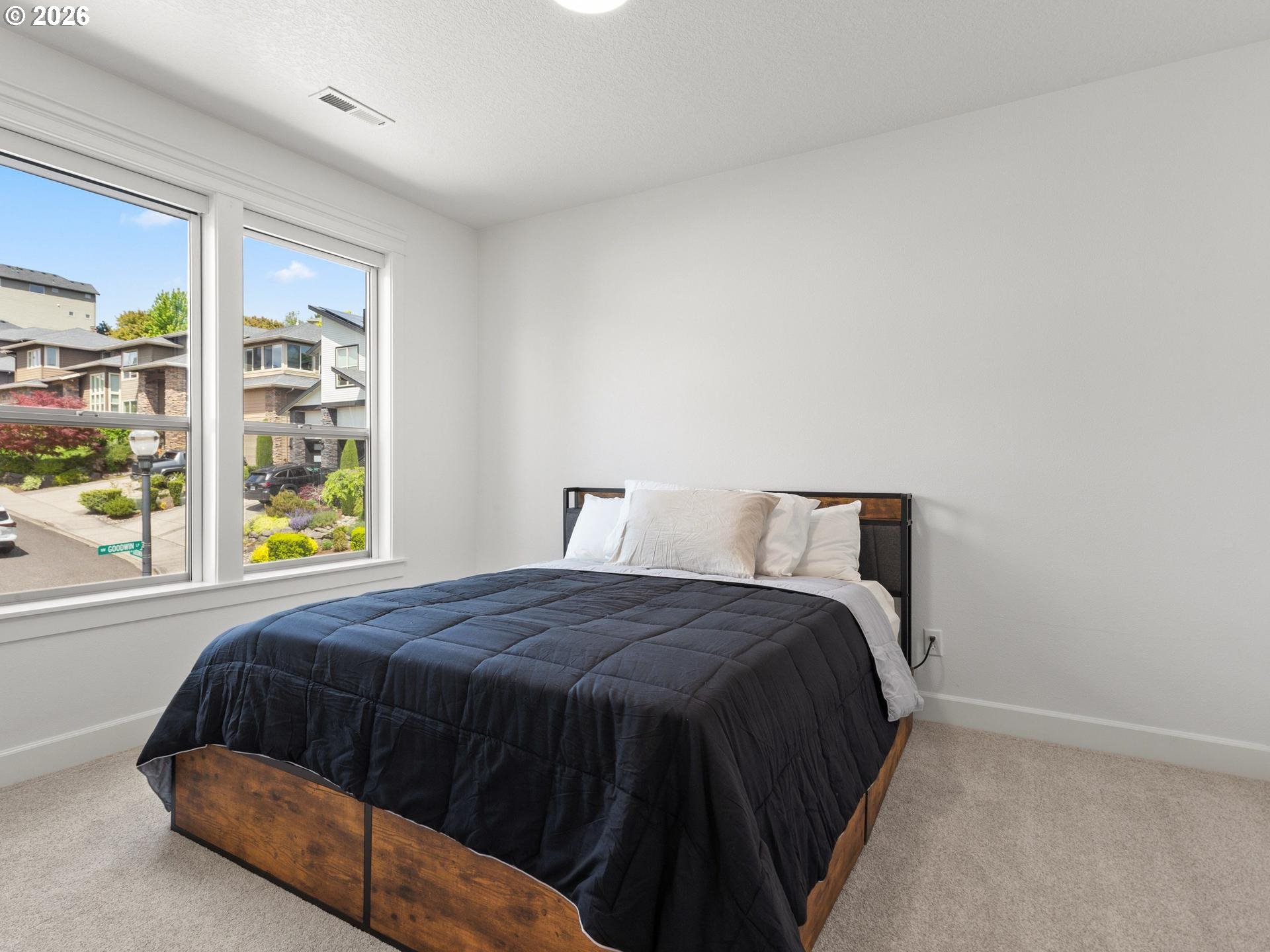 1012 Northwest Goodwin Street Camas, WA 98607 - Photo 31 of 44 a bedroom with a bed and window