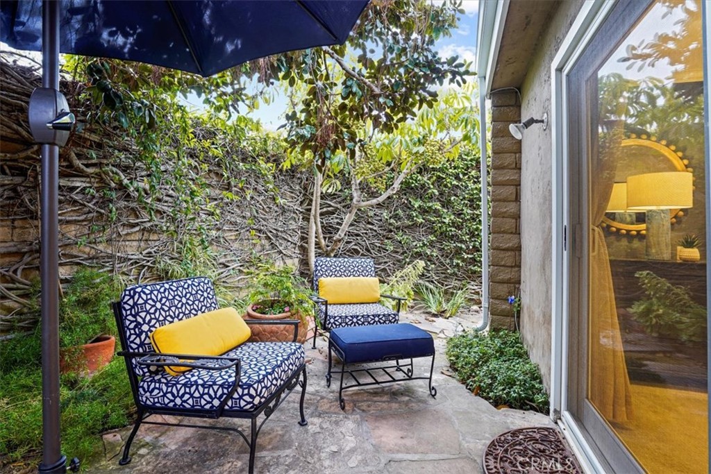 23802 Cassandra Bay Dana Point, CA 92629 - Photo 25 of 56 a backyard of a house with outdoor seating