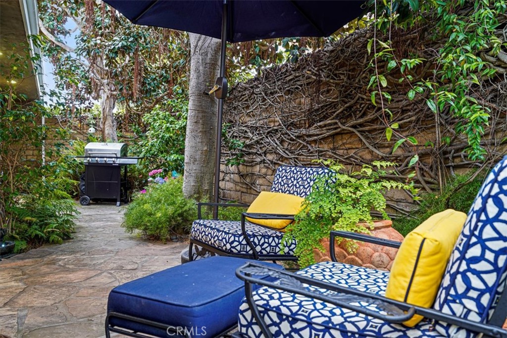 23802 Cassandra Bay Dana Point, CA 92629 - Photo 26 of 56 a backyard of a house with outdoor seating