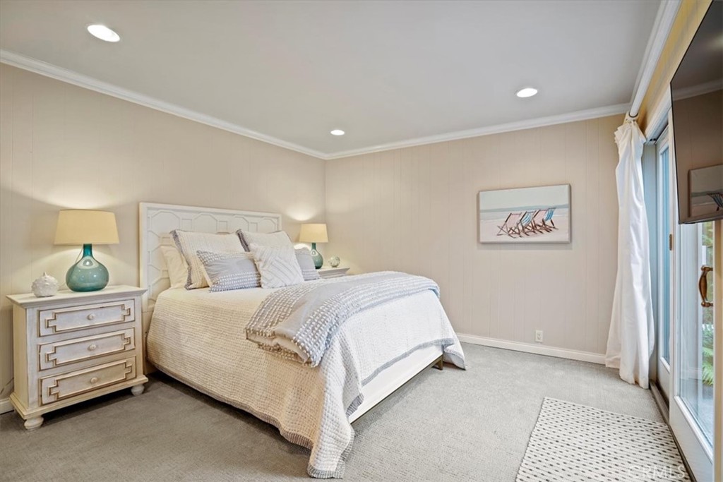 23802 Cassandra Bay Dana Point, CA 92629 - Photo 45 of 56 a bedroom with a bed and a cabinets