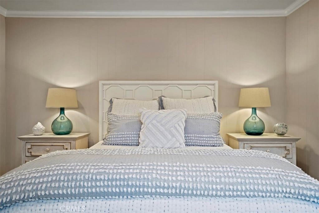 23802 Cassandra Bay Dana Point, CA 92629 - Photo 46 of 56 a bedroom with a bed and window