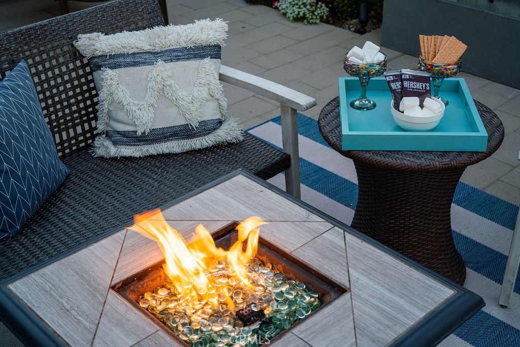 23802 Cassandra Bay Dana Point, CA 92629 - Photo 53 of 56 a dining room with furniture and wooden floor