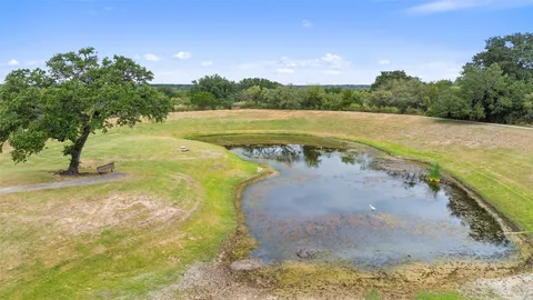 a view of a lake with outdoor space