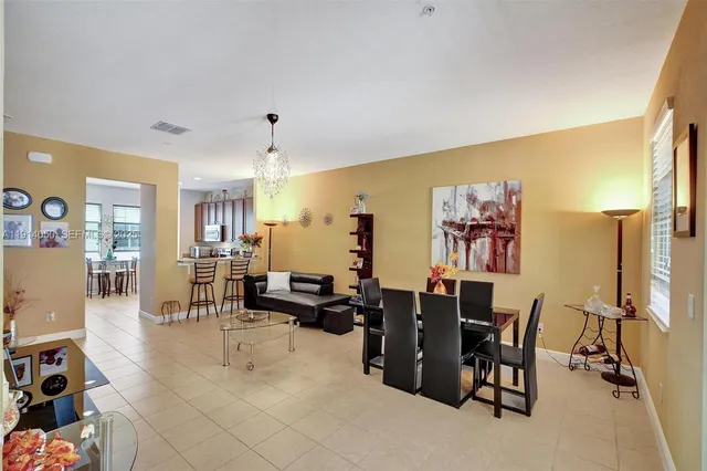 a view of a livingroom with furniture and a window