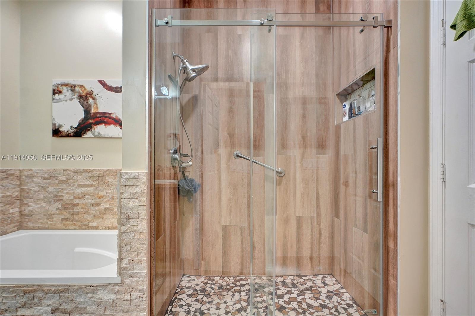 2659 Southwest 118 Road Miramar, FL 33025 - Photo 16 of 28 a bathroom with a shower