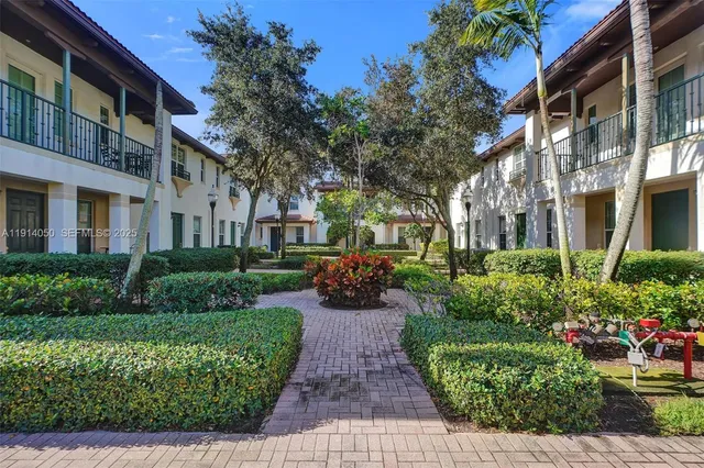 a view of a house with a garden