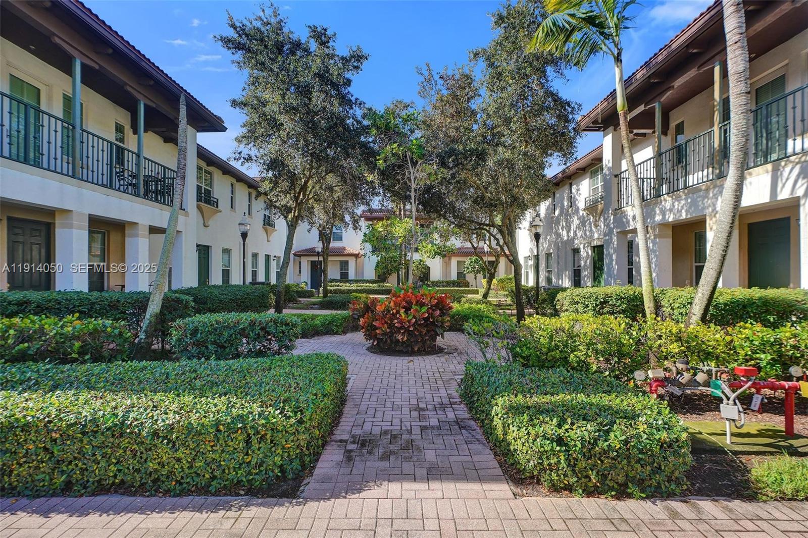 2659 Southwest 118 Road Miramar, FL 33025 - Photo 25 of 28 a view of a house with a garden