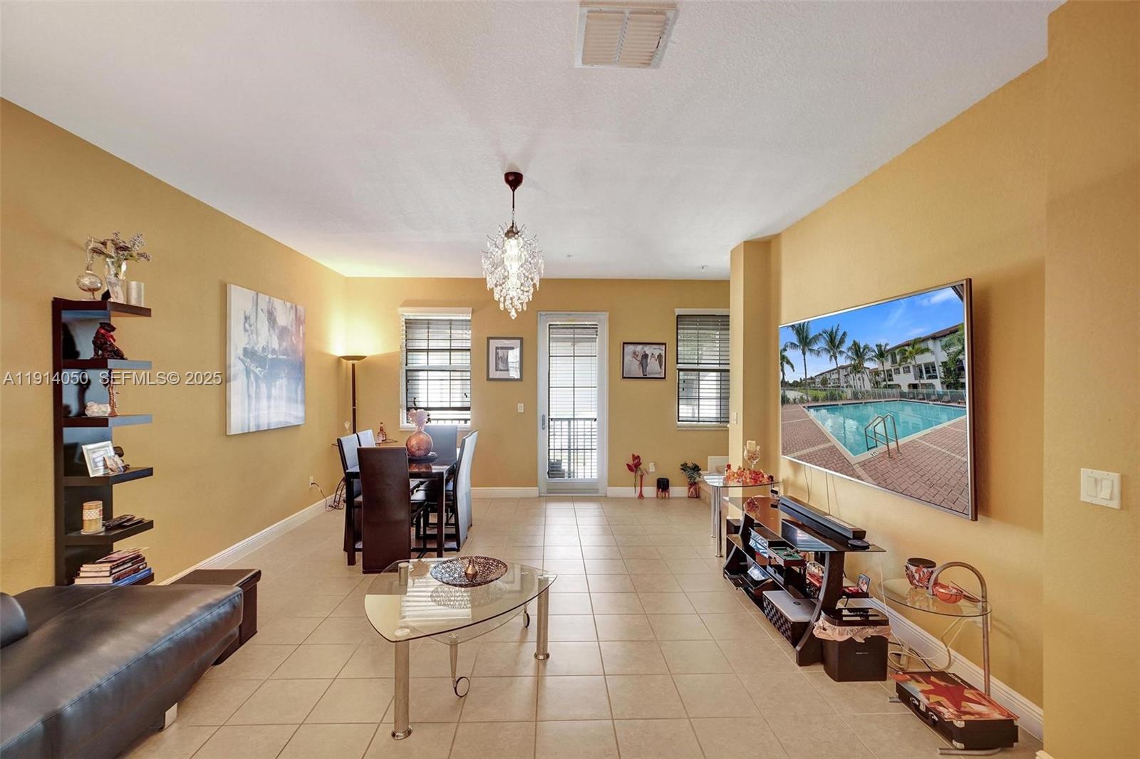 2659 Southwest 118 Road Miramar, FL 33025 - Photo 3 of 28 a living room with furniture and wooden floor