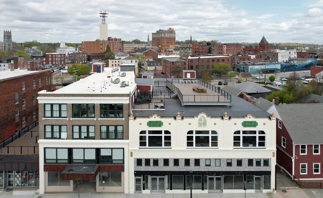 a large building with a city view