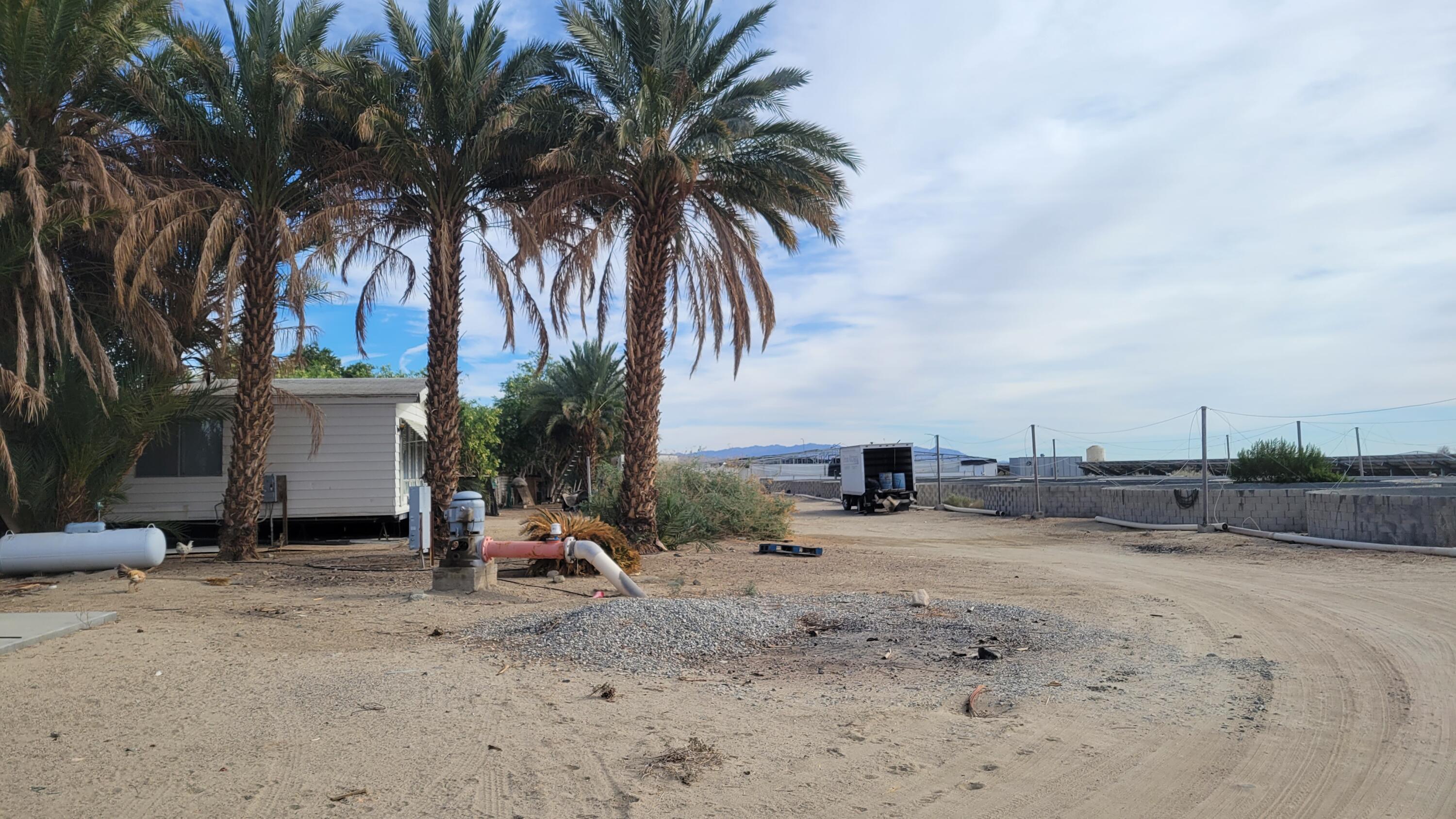 96400 70th Avenue Mecca, CA 92254 - Photo 2 of 15 a view of a backyard with a sitting area