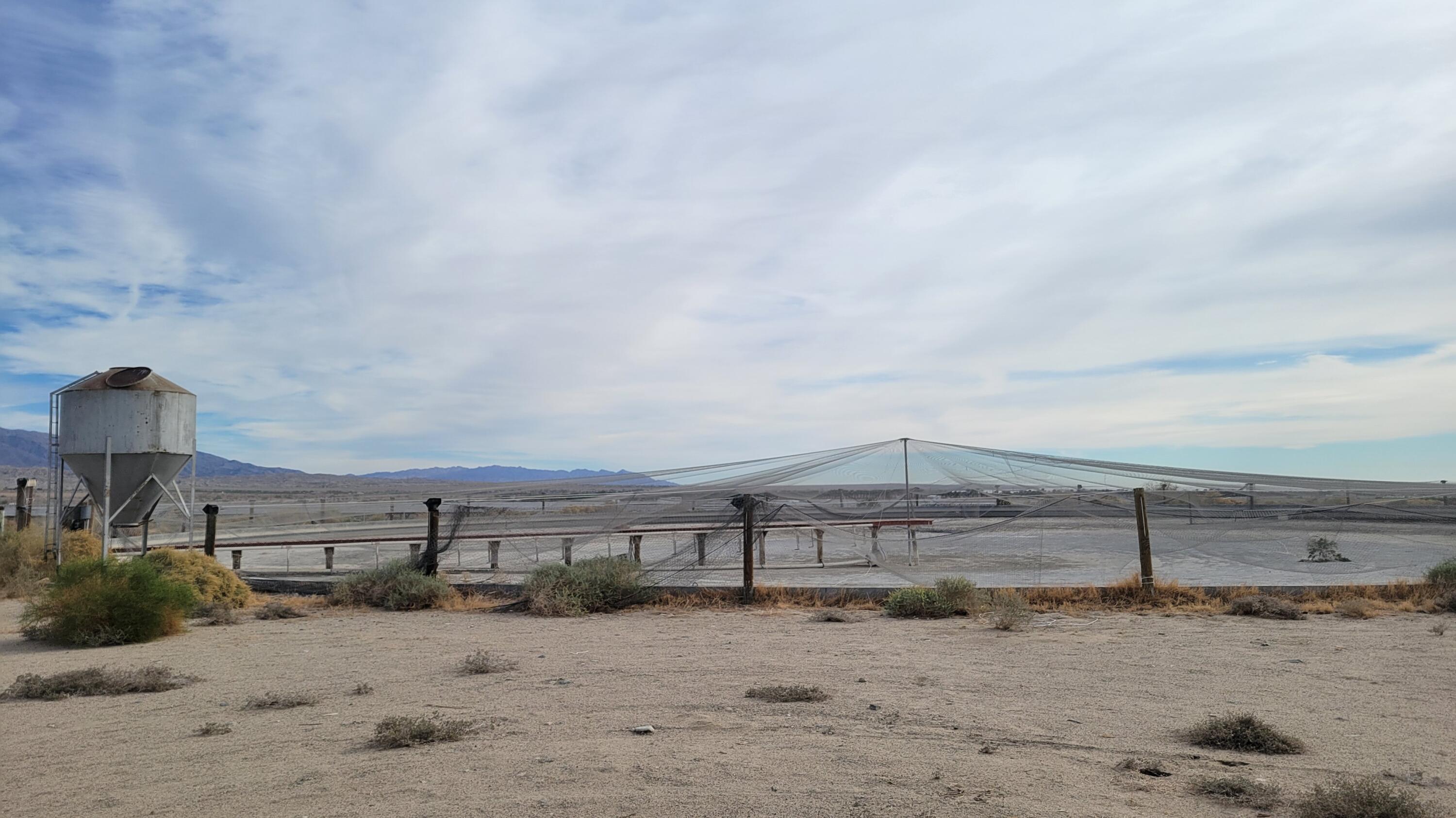 96400 70th Avenue Mecca, CA 92254 - Photo 10 of 15 a view of a dry yard with wooden fence