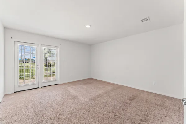 an empty room with windows