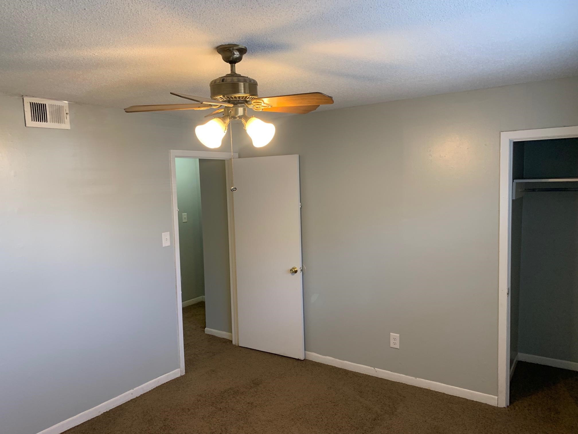 677 Miles, Unit 677 Memphis, TN 38111 - Photo 14 of 17 a view of a chandelier fan in a room