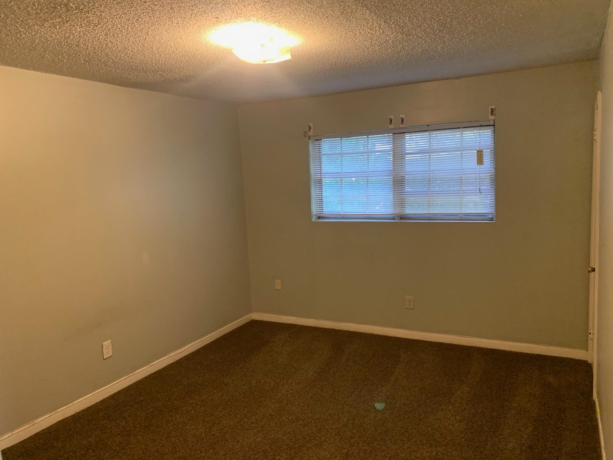 677 Miles, Unit 677 Memphis, TN 38111 - Photo 15 of 17 an empty room with a empty space and a window