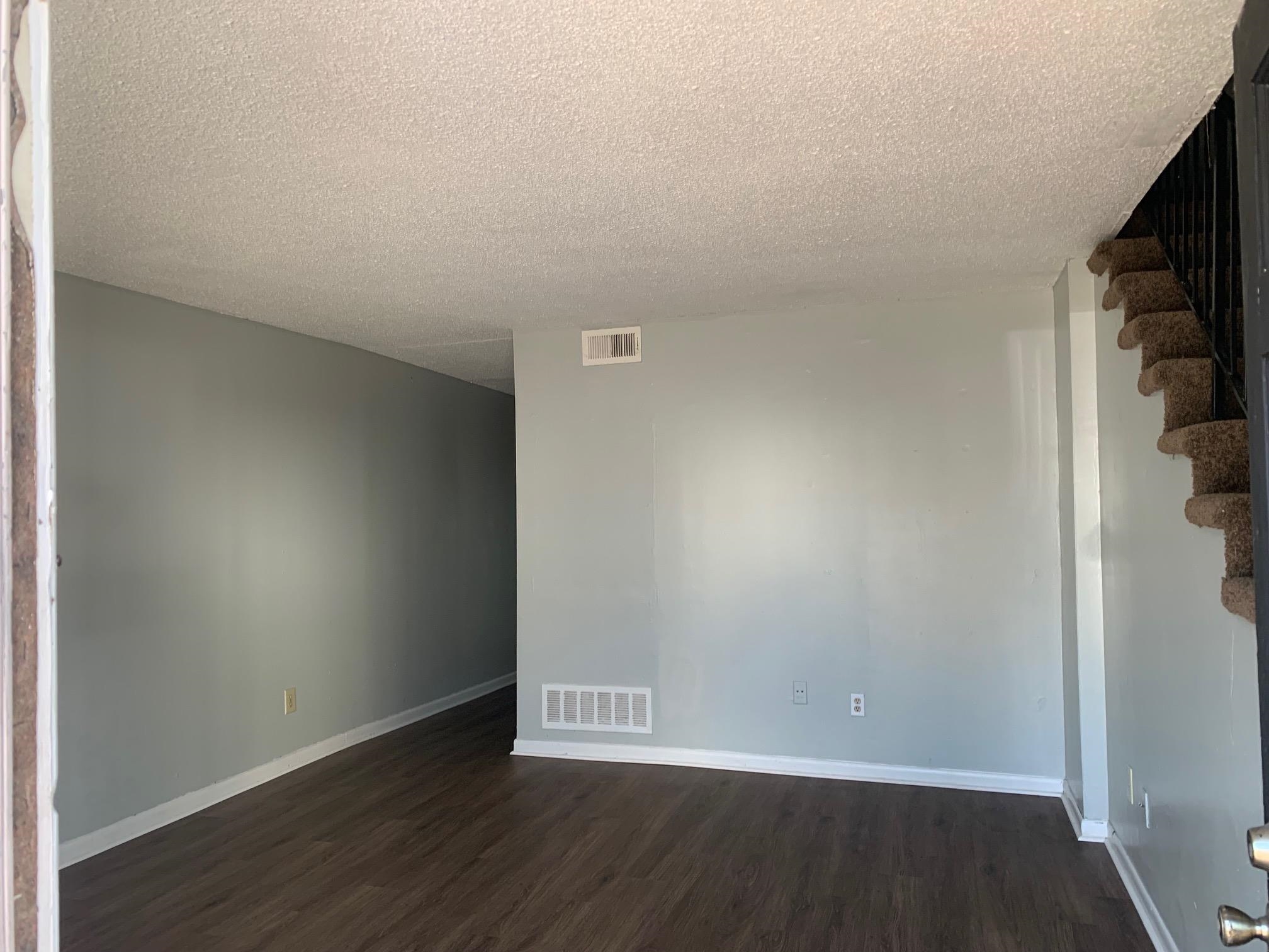 677 Miles, Unit 677 Memphis, TN 38111 - Photo 9 of 17 a view of an empty room with wooden floor and a window