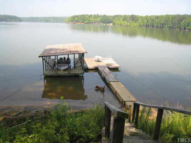 311 Kerr Lake Road Henderson, NC 27537 - Photo 8 of 10 a view of a lake with a outdoor space