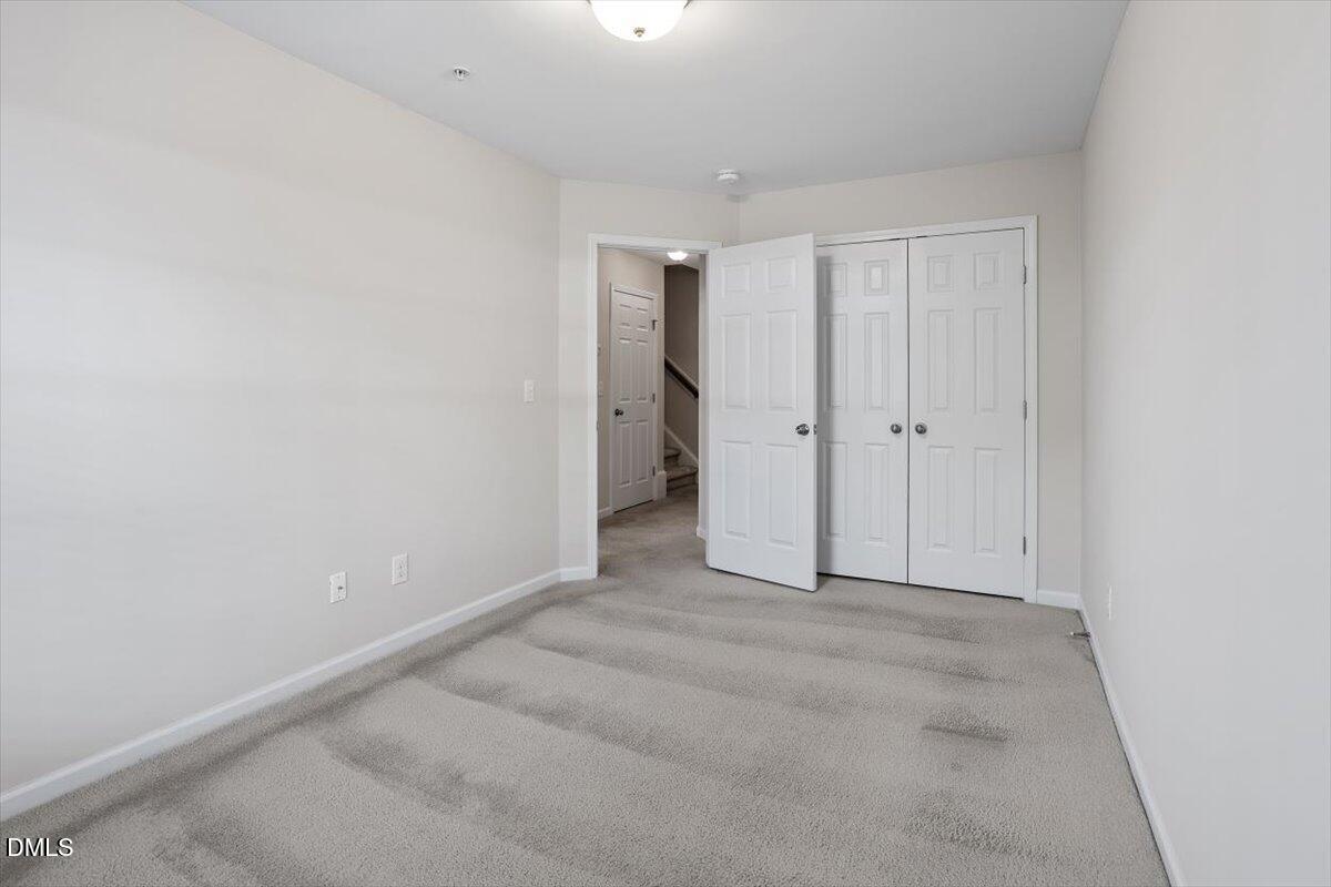 1120 Renewal Place, Unit 113 Raleigh, NC 27603 - Photo 23 of 38 a view of an empty room