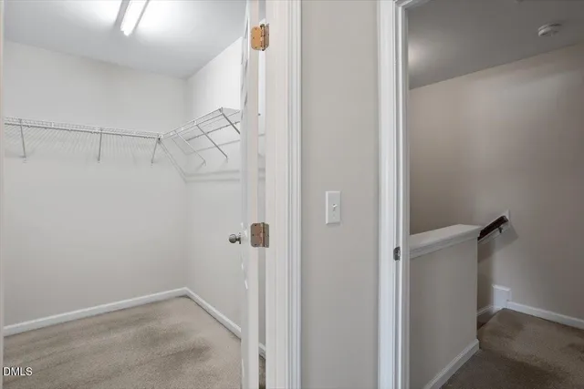 a view of a hallway with closet