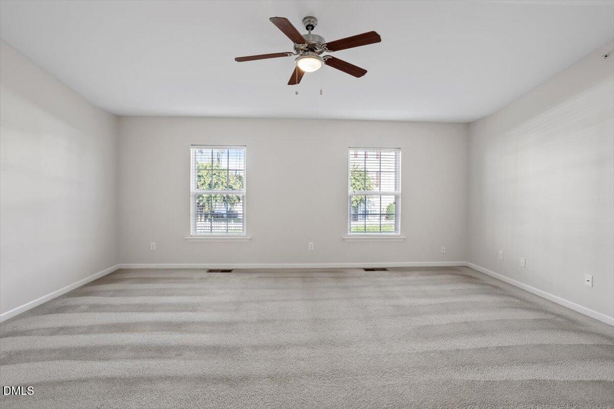 1120 Renewal Place, Unit 113 Raleigh, NC 27603 - Photo 26 of 38 a view of an empty room with a window