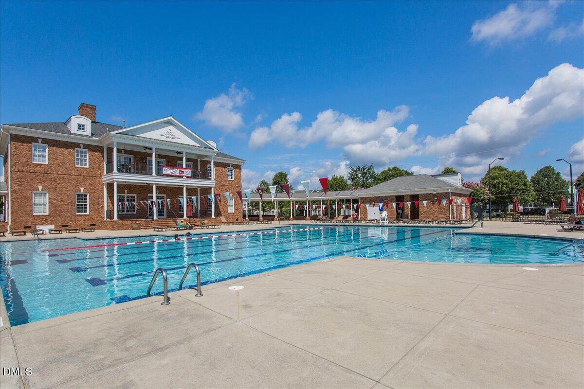 1120 Renewal Place, Unit 113 Raleigh, NC 27603 - Photo 33 of 38 a view of a house with a yard