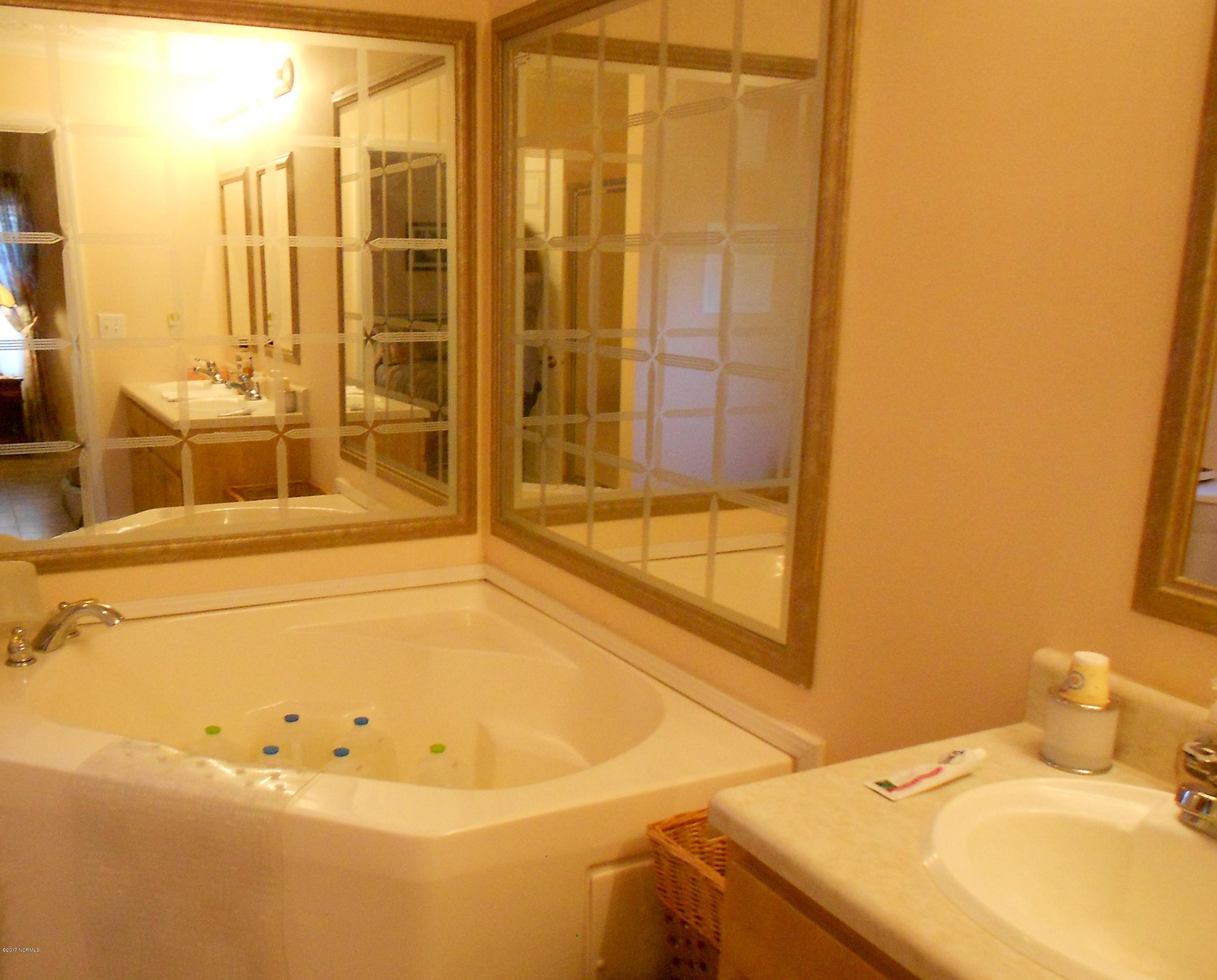 3701 East Boiling Spring Road Southport, NC 28461 - Photo 12 of 54 master bath