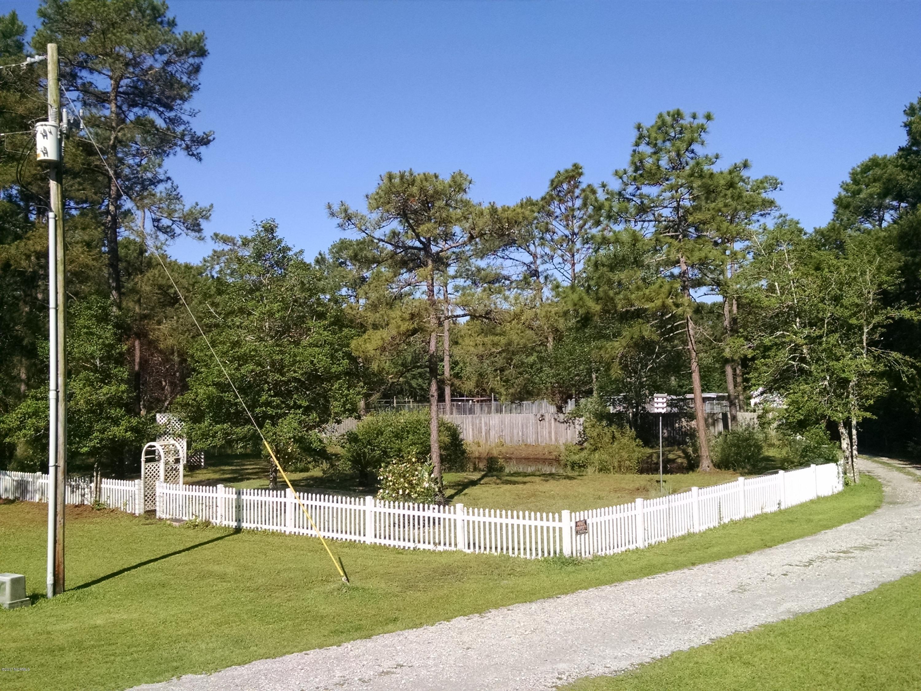 3701 East Boiling Spring Road Southport, NC 28461 - Photo 32 of 54 garden pond