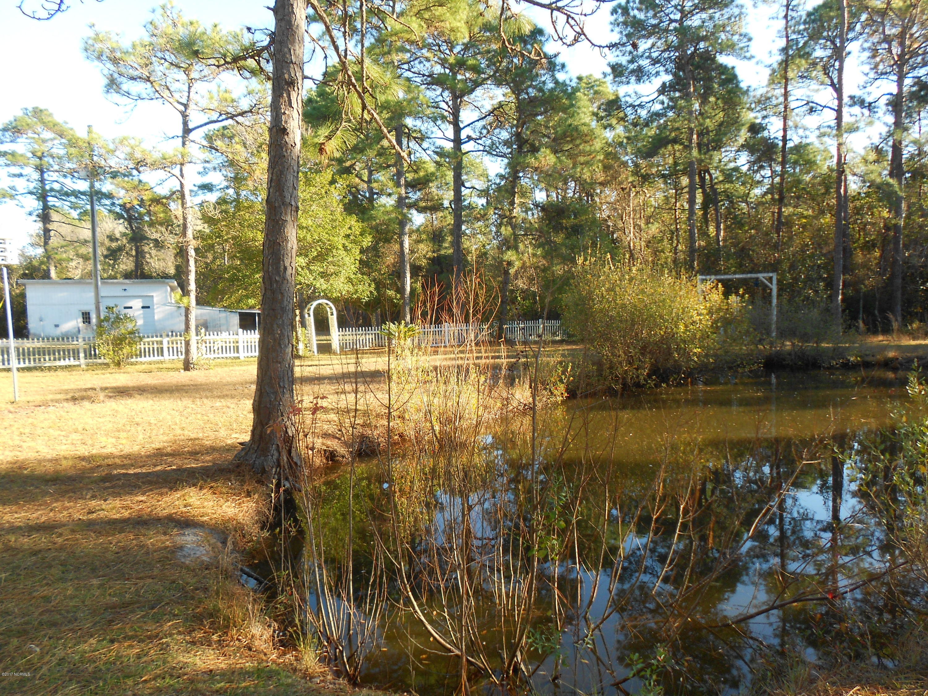 3701 East Boiling Spring Road Southport, NC 28461 - Photo 35 of 54 garden pond