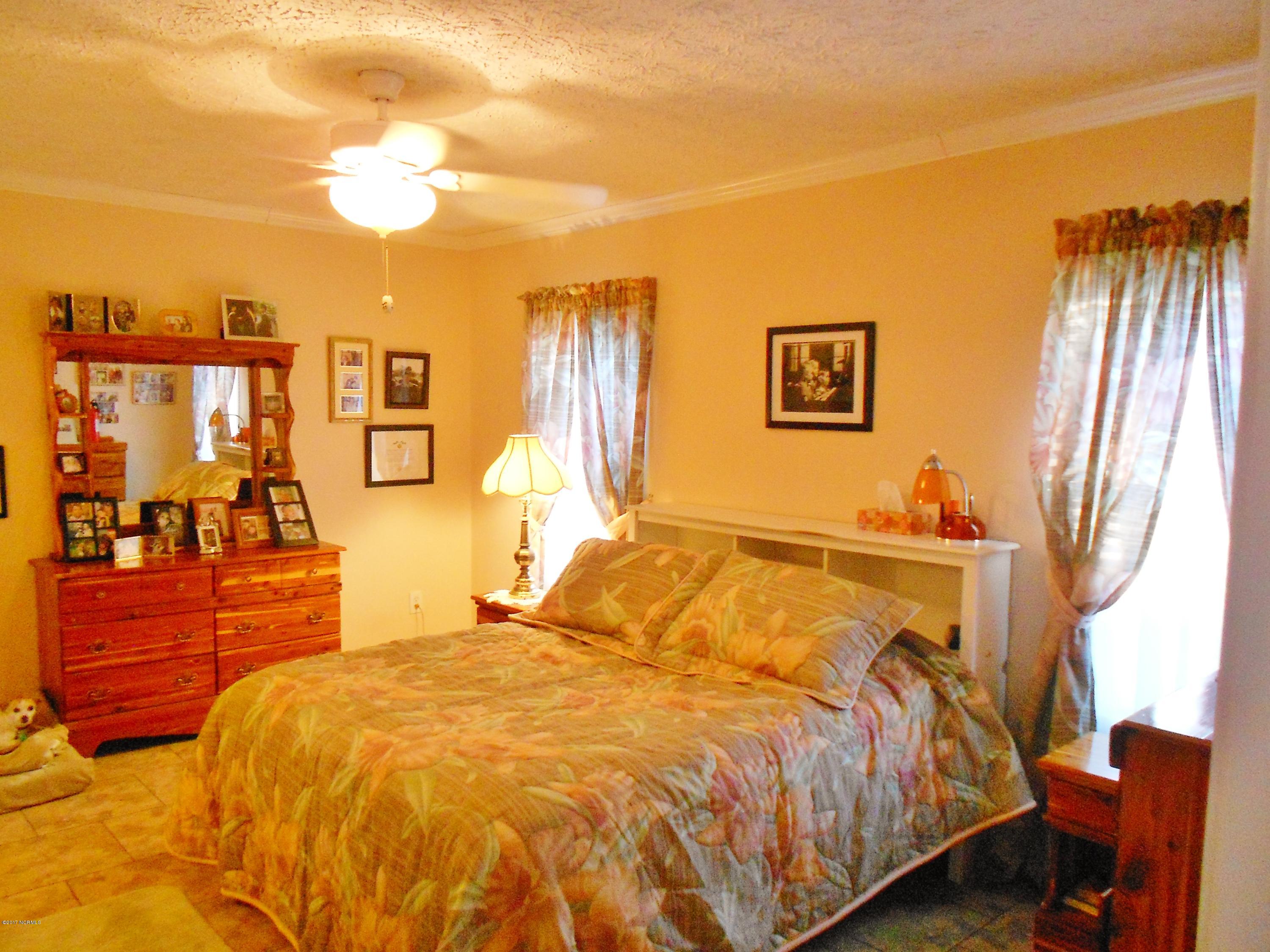 3701 East Boiling Spring Road Southport, NC 28461 - Photo 6 of 54 Master bedroom