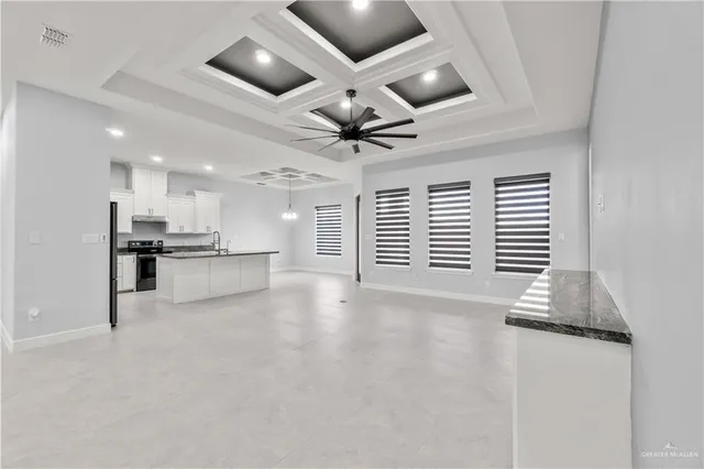 a view of kitchen and windows