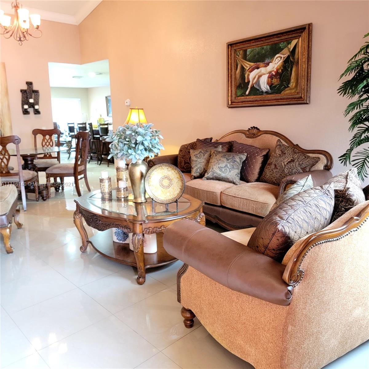 12989 Southwest 251st Terrace Homestead, FL 33032 - Photo 3 of 28 a living room with furniture