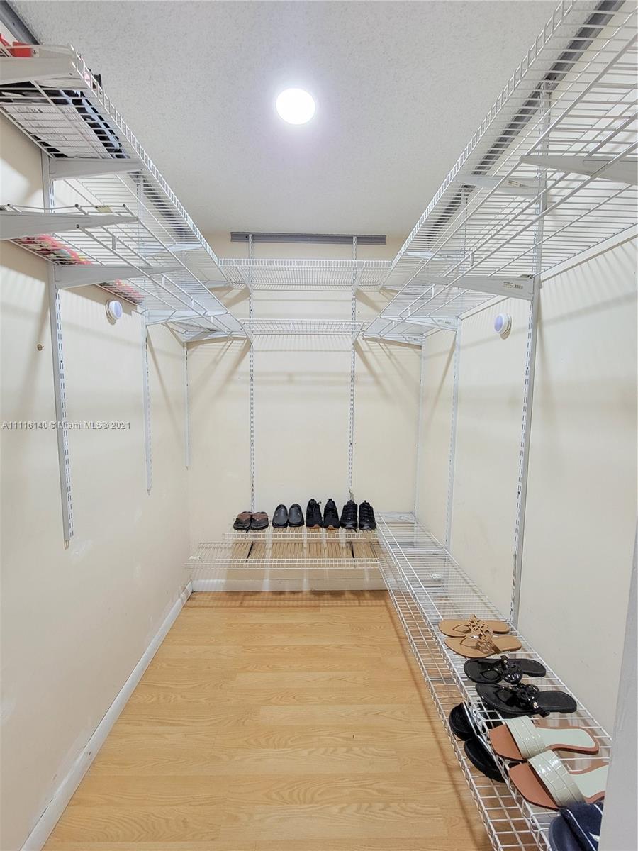 12989 Southwest 251st Terrace Homestead, FL 33032 - Photo 25 of 28 a room with lots of appliances and a shower