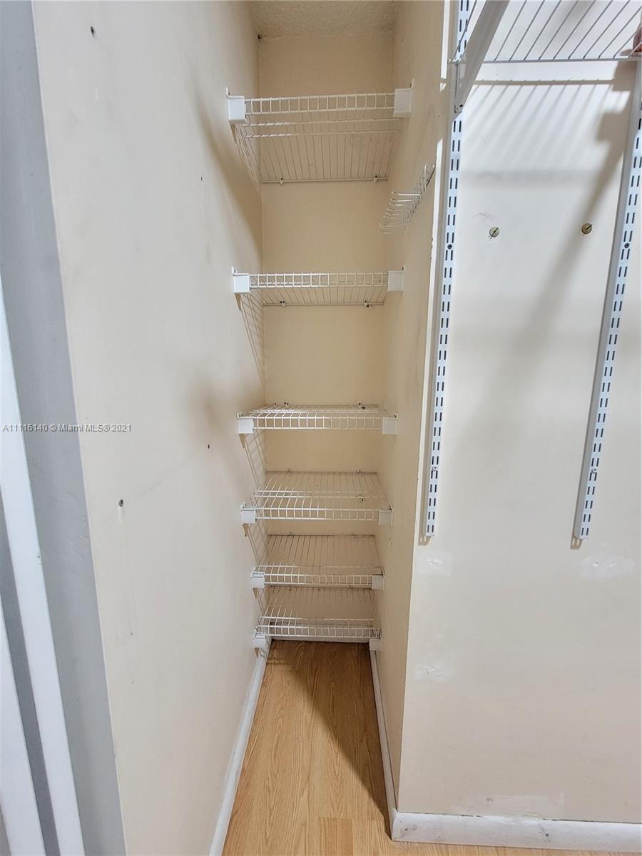 12989 Southwest 251st Terrace Homestead, FL 33032 - Photo 26 of 28 a view of walk in closet