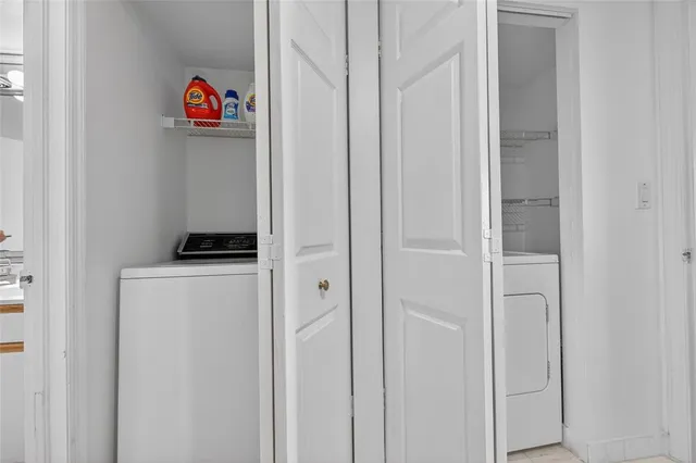 a storage room with washer and dryer