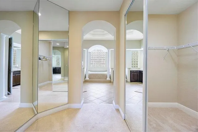 a kitchen with a stove a sink and a refrigerator