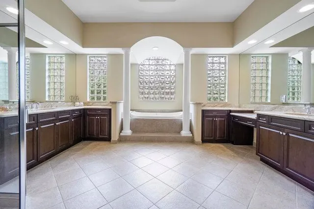 a view of an entryway with a floor to ceiling window