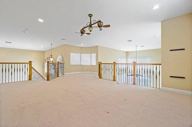 a bathroom with a double vanity sink and mirror