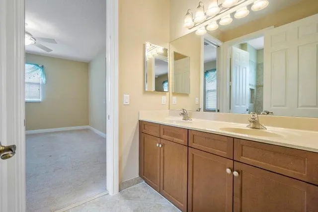 a bathroom with a bathtub and window