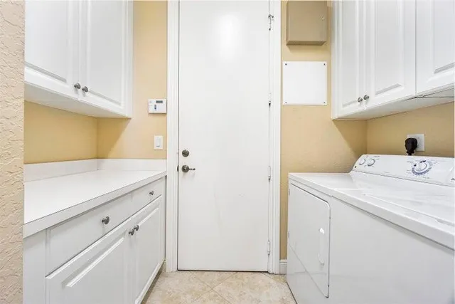 a view of a swimming pool and a yard