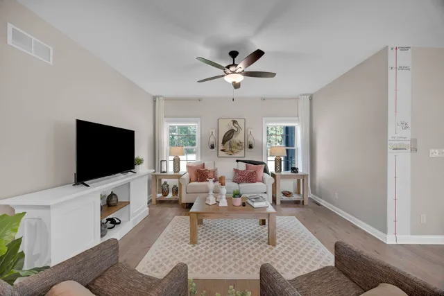 a large kitchen with kitchen island a sink a counter space and stainless steel appliances