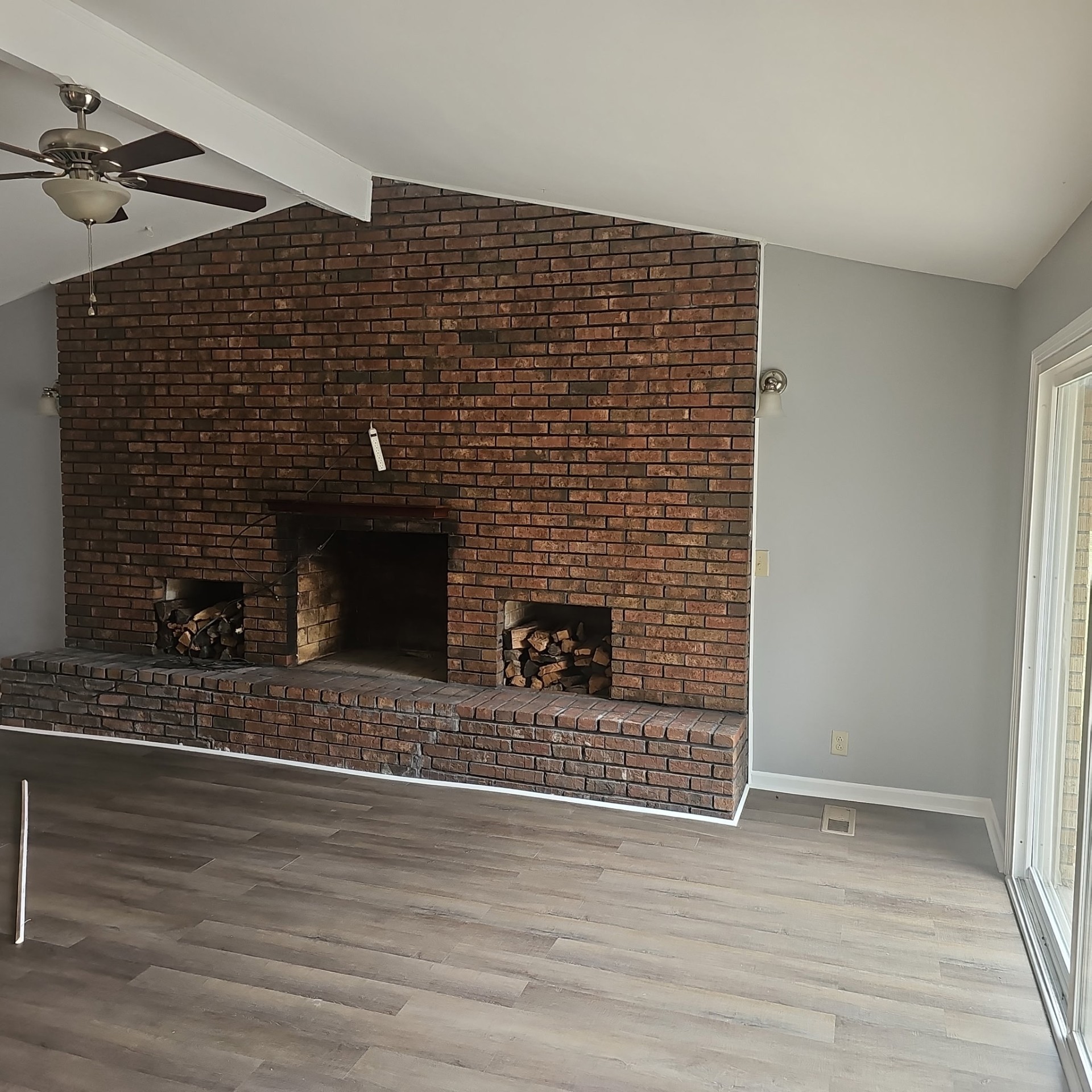 4100 Cato Road Nashville, TN 37218 - Photo 15 of 17 a view of a fireplace with wooden floor